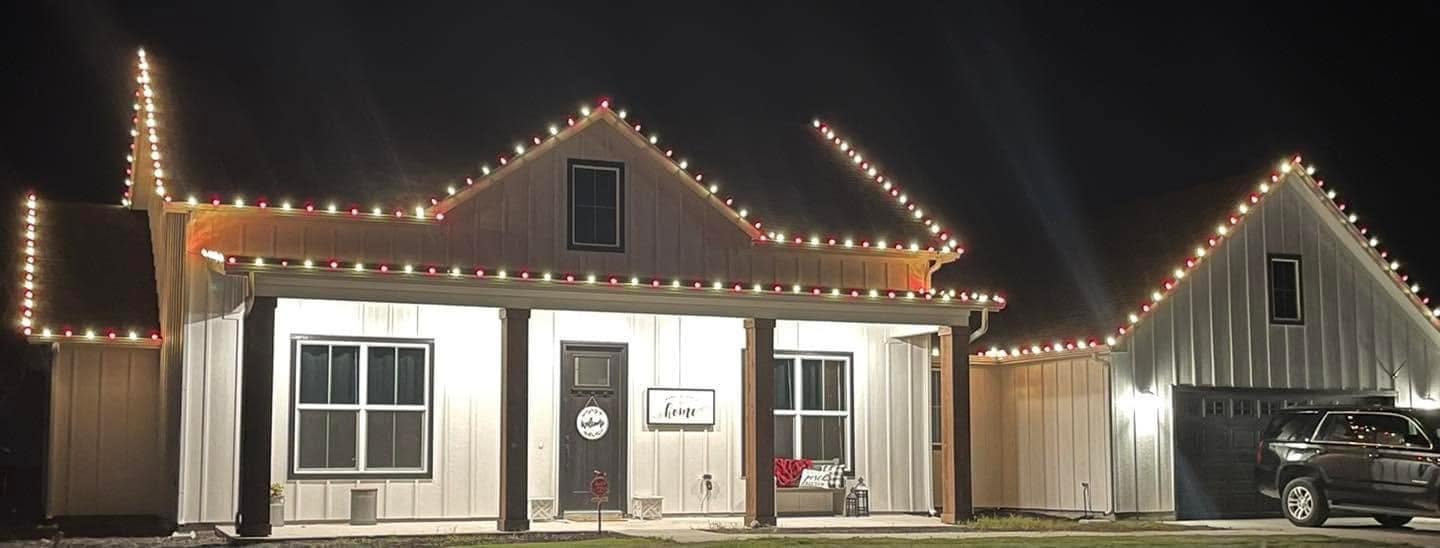 Commercial storefront with colorful Christmas lights